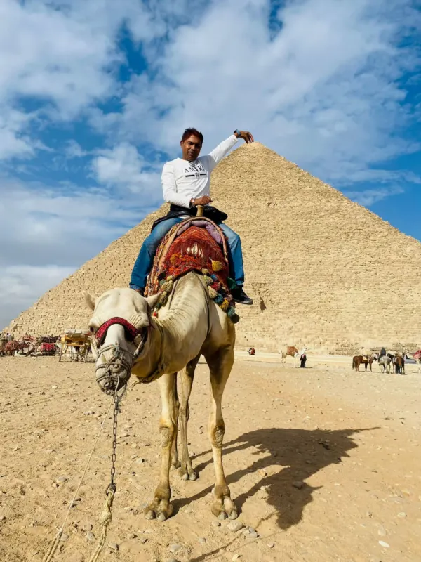 Camel ride in front of the Great Pyramid, Egypt